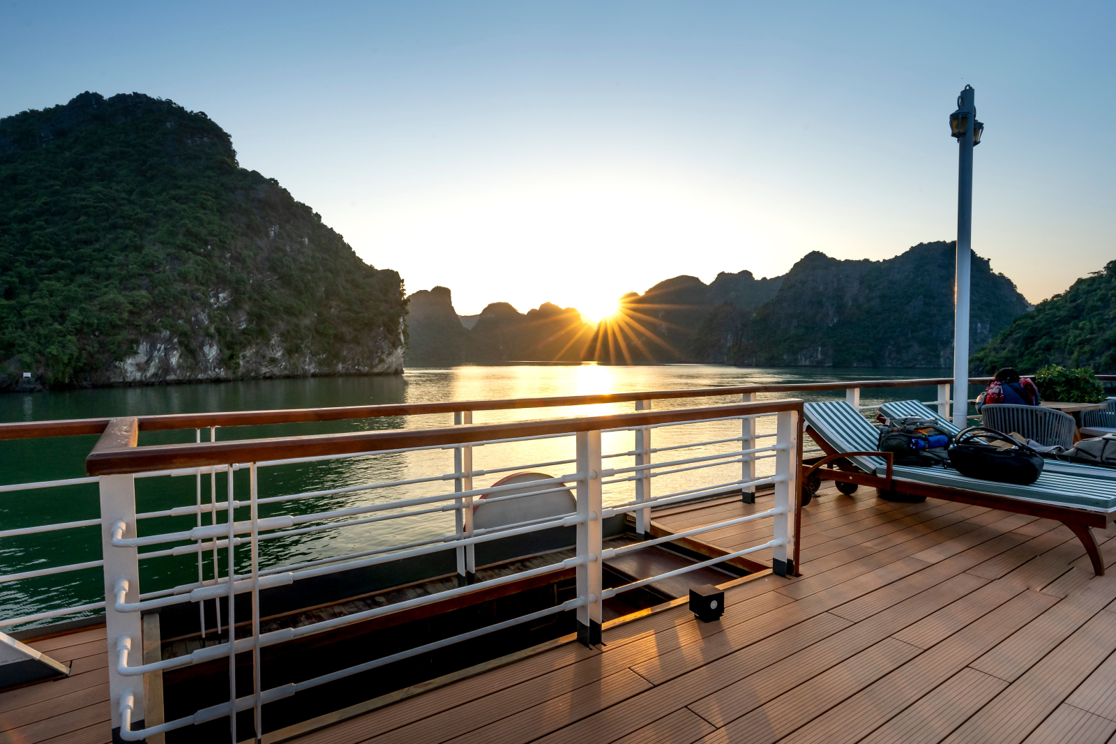 Halong Bay sunrise on sundeck. Photo by pexels.