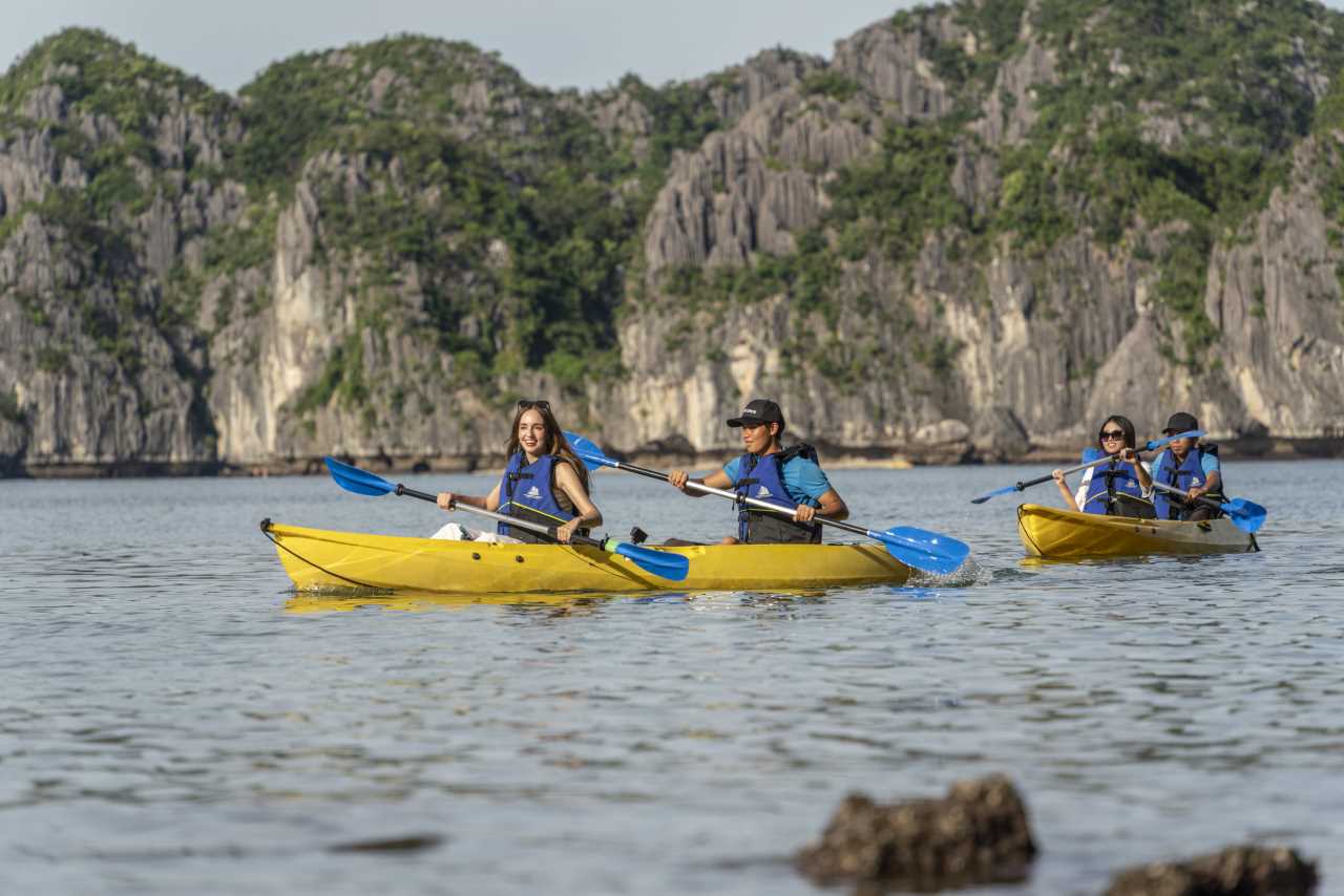 Kayaking in Halong Bay.. Photo by Indochine Grand Cruise.